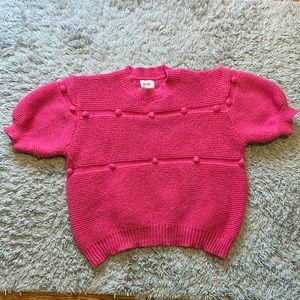 Pink puff sleeve sweater with pom poms